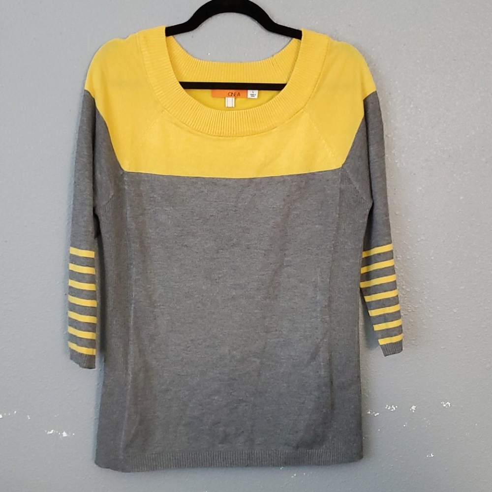 One A 3/4 quarter sleve crewneck sweater